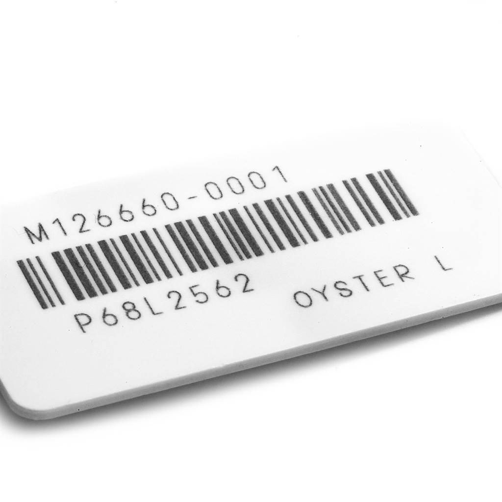 The image shows a close-up of a barcode tag for a Rolex Sea-Dweller 126660 Men
s Stainless Steel Black Dial 126660 Men
s Stainless Steel Black Dial model, referencing model number M126660-0001.