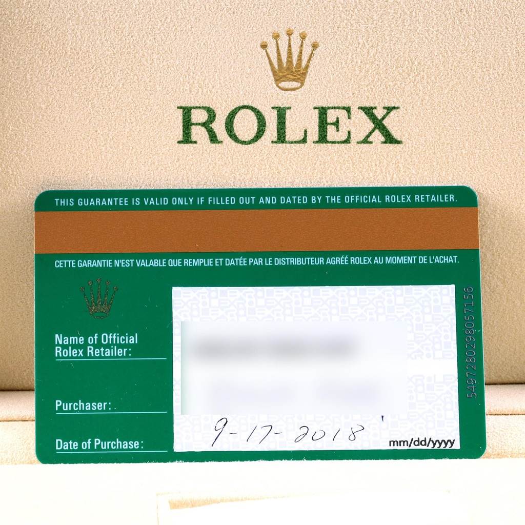 The image shows the guarantee card for a Rolex Sea-Dweller 126660 Men
s Stainless Steel Black Dial 126660 Men
s Stainless Steel Black Dial watch, detailing the purchase date and retailer information.
