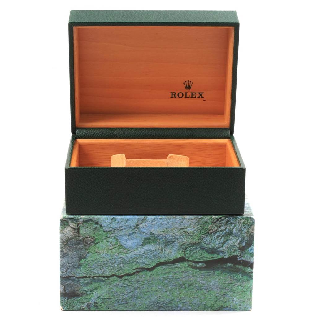 The image shows an open Rolex watch box for the Sea-Dweller model from a front angle, including the inner compartment and lid with the Rolex logo.