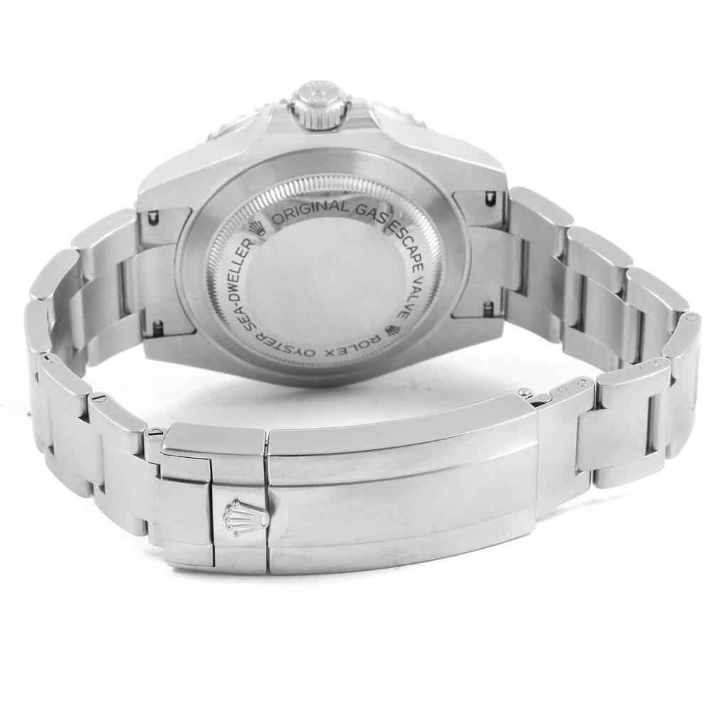 The image shows the back view of a Rolex Sea-Dweller 116600 Men
s Stainless Steel Black Dial 116600 Men
s Stainless Steel Black Dial watch, highlighting the case back, bracelet, and clasp with the Rolex logo.