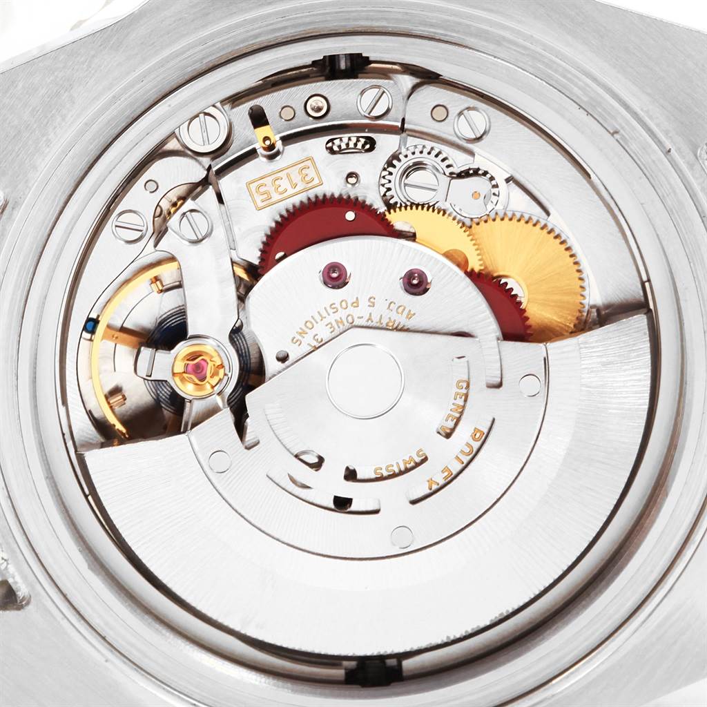 This is an image of the movement from the back of a Rolex Sea-Dweller 116600 Men
s Stainless Steel Black Dial 116600 Men
s Stainless Steel Black Dial watch, showing intricate gears and components.