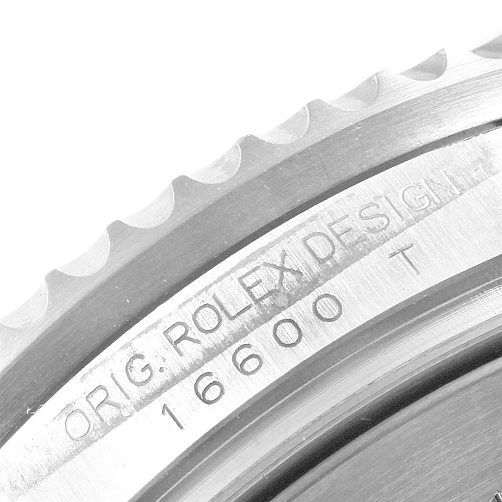 The image shows a close-up of the model and design engraving on the bezel of a Rolex Sea-Dweller 16600 Men
s Stainless Steel Black Dial 16600 Men
s Stainless Steel Black Dial 16600 watch.