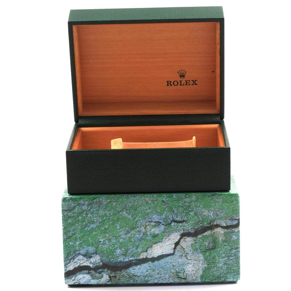 The image shows an open Rolex watch box for the Sea-Dweller model, displaying its interior and exterior design.