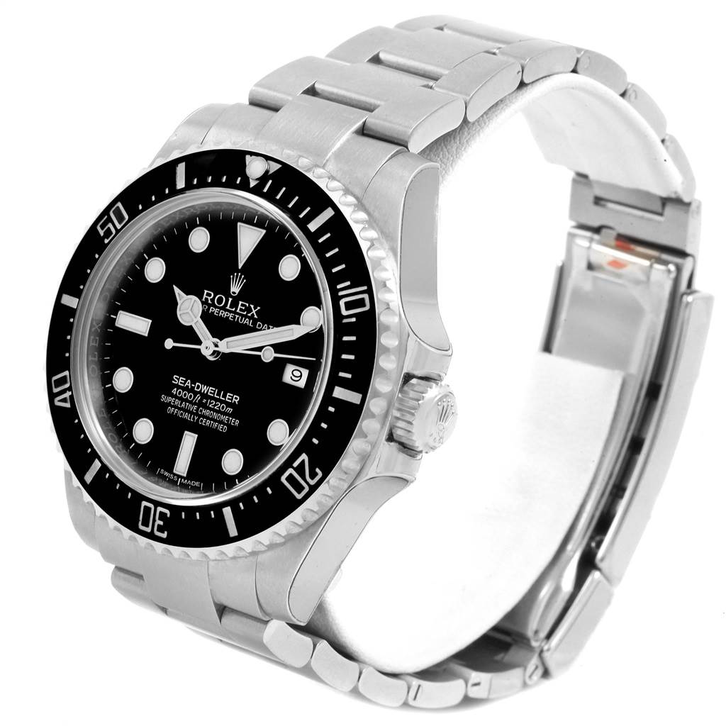 This Rolex Sea-Dweller 116600 Men
s Stainless Steel Black Dial 116600 Men
s Stainless Steel Black Dial watch is viewed from a front angle, showcasing the face, bezel, crown, and bracelet.