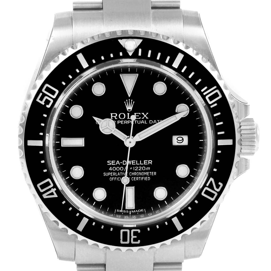 The image shows a front view of a Rolex Sea-Dweller 116600 Men
s Stainless Steel Black Dial 116600 Men
s Stainless Steel Black Dial watch, highlighting its black dial, luminescent markers, date display, and bezel.