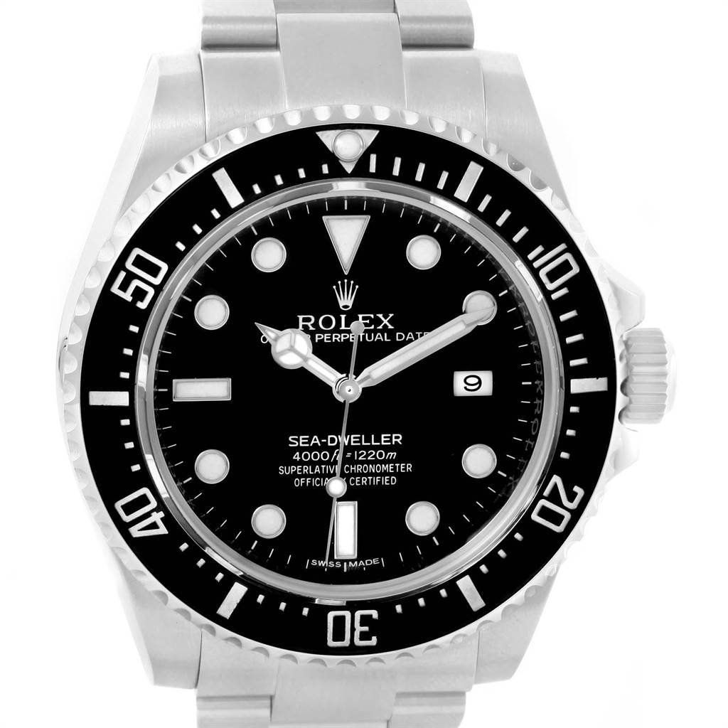 The image shows a front view of a Rolex Sea-Dweller 116600 Men
s Stainless Steel Black Dial 116600 Men
s Stainless Steel Black Dial watch, detailing the black dial, hour markers, and bezel.