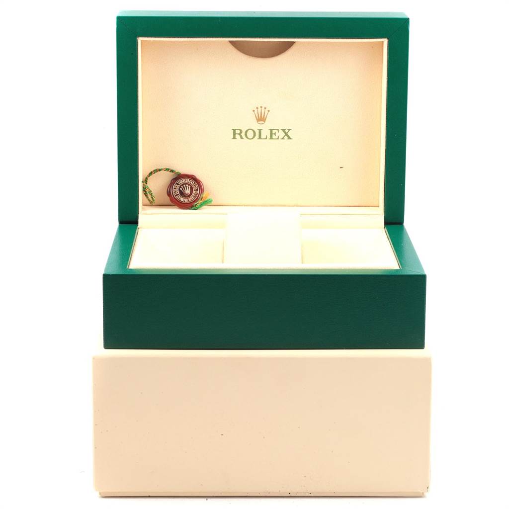 The image shows an open green box for a Rolex Sea-Dweller 116660 Men
s Stainless Steel Black Dial 116660 Men
s Stainless Steel Black Dial watch, displaying the interior with the logo and a tag.