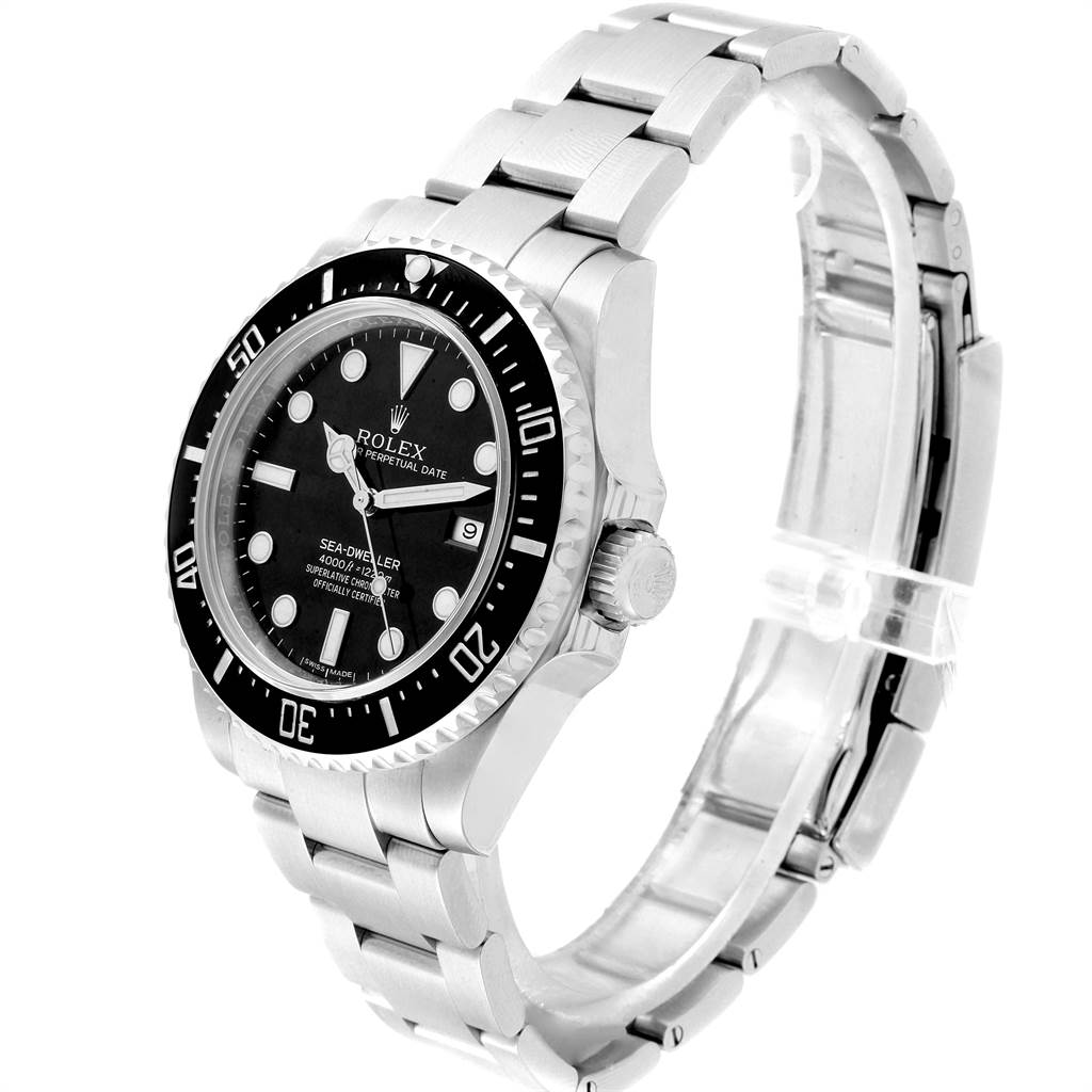 The image shows a side angle of a Rolex Sea-Dweller 116600 Men
s Stainless Steel Black Dial 116600 Men
s Stainless Steel Black Dial watch, highlighting the face, bezel, crown, and bracelet.