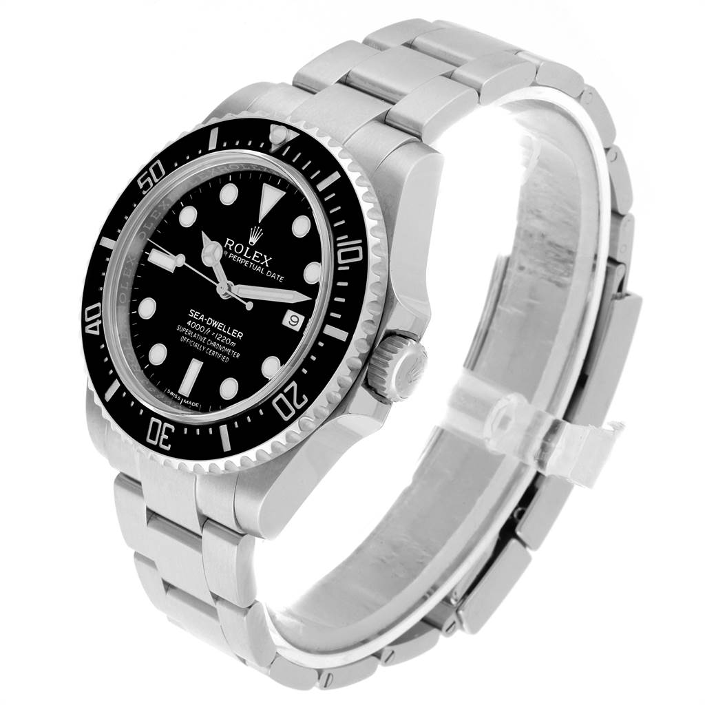 The image shows a side and front angle of the Rolex Sea-Dweller 116600 Men
s Stainless Steel Black Dial 116600 Men
s Stainless Steel Black Dial watch, showcasing its bezel, dial, and bracelet.