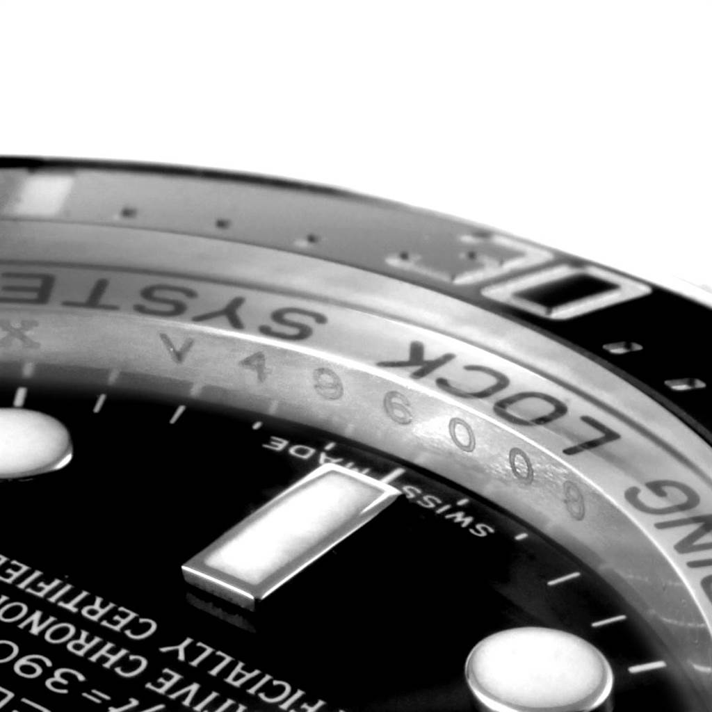 Close-up of the bezel and dial edge of the Rolex Sea-Dweller 116660 Men
s Stainless Steel Black Dial 116660 Men
s Stainless Steel Black Dial, with focus on markers and text.