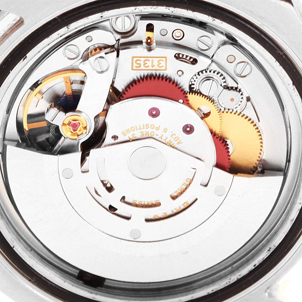 The image shows the internal movement components of a Rolex Sea-Dweller 116600 Men
s Stainless Steel Black Dial 116600 Men
s Stainless Steel Black Dial watch, viewed from the back.