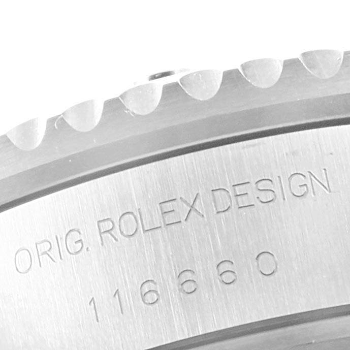 The image shows a close-up angle of the Rolex Sea-Dweller 116660 Men
s Stainless Steel Black Dial 116660 Men
s Stainless Steel Black Dial
s bezel and engraved case side with the design and model number.