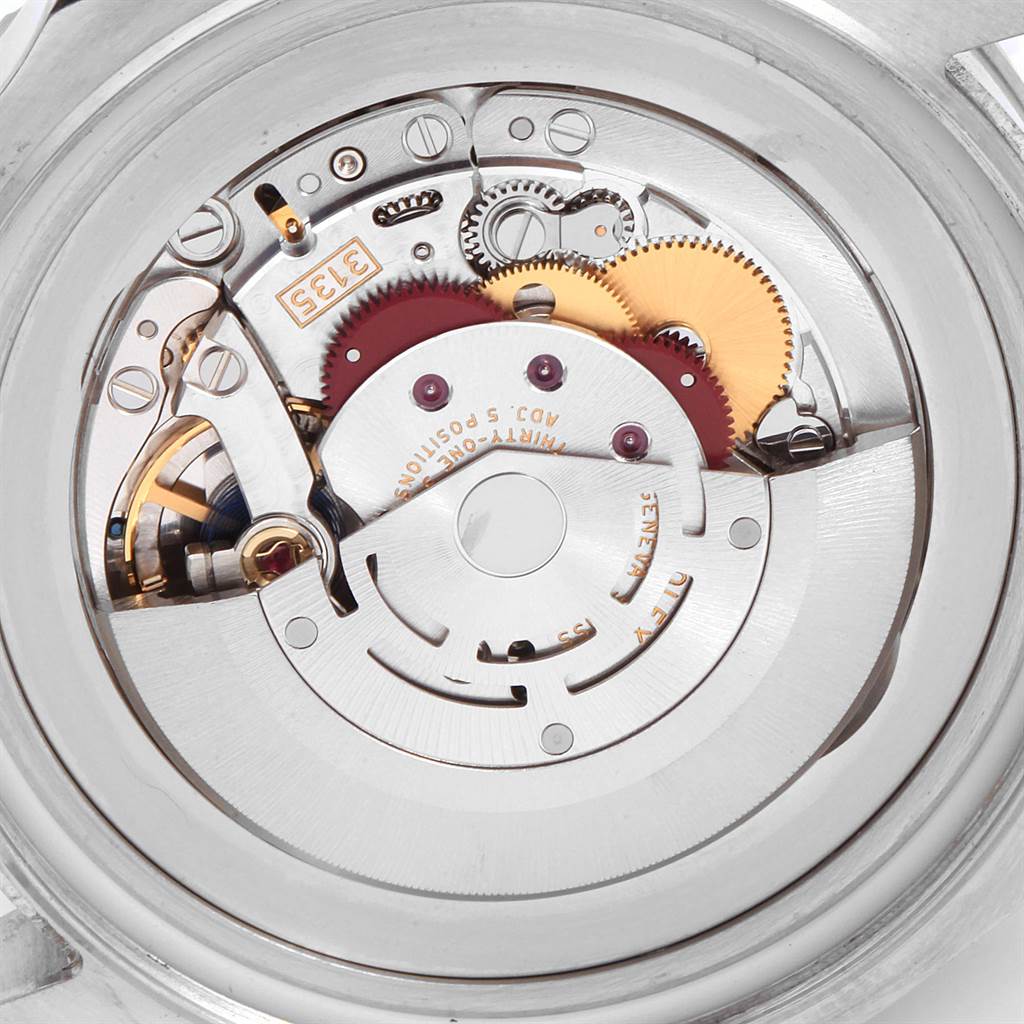 This image shows the intricate mechanical movement of the Rolex Sea-Dweller 116660 Men
s Stainless Steel Black Dial 116660 Men
s Stainless Steel Black Dial watch from a close-up, back-angle view.