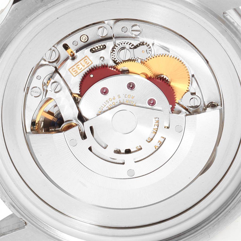 This image shows the internal mechanism of a Rolex Sea-Dweller 116660 Men's Stainless Steel Blue Dial 116660 Men's Stainless Steel Blue Dial watch, viewed from the back, revealing its gears and rotor.