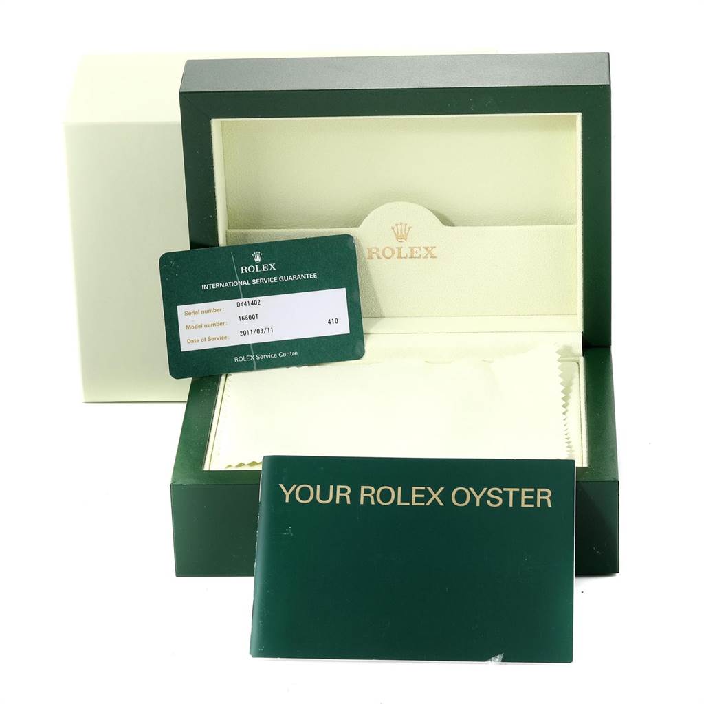 This image shows a Rolex Sea-Dweller 16600 Men
s Stainless Steel Black Dial 16600 Men
s Stainless Steel Black Dial box, warranty card, and instruction manual from a front angle.