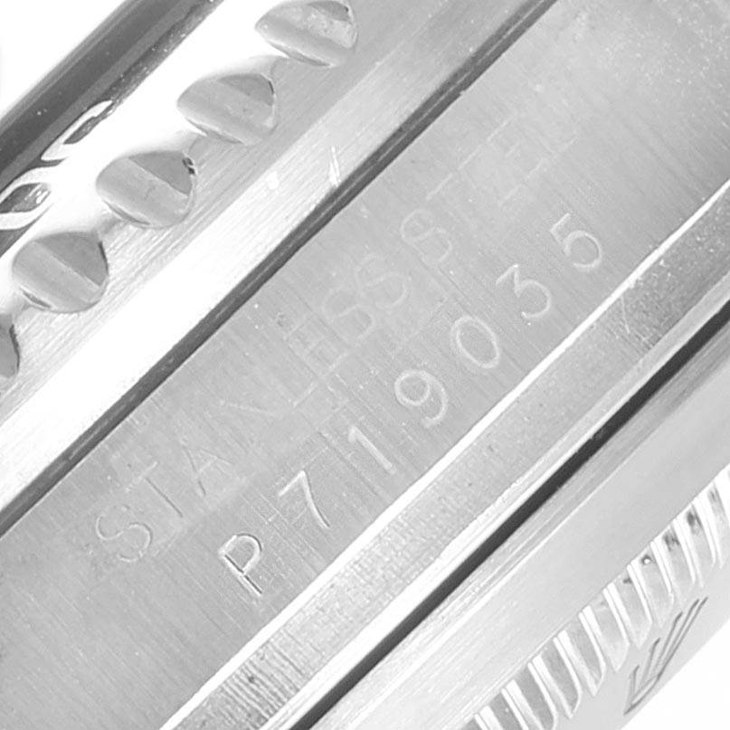 This image shows a close-up of the side with serial markings and bezel edge of the Rolex Sea-Dweller 16600 Men
s Stainless Steel Black Dial 16600 Men
s Stainless Steel Black Dial watch.