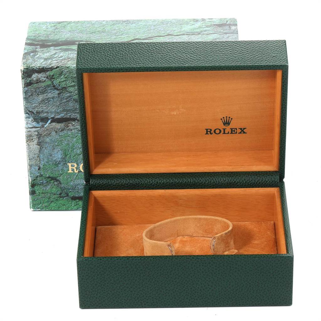 The image shows an open box of a Rolex Sea-Dweller 16600 Men
s Stainless Steel Black Dial 16600 Men
s Stainless Steel Black Dial watch, displaying the inner cushion and the outer packaging.