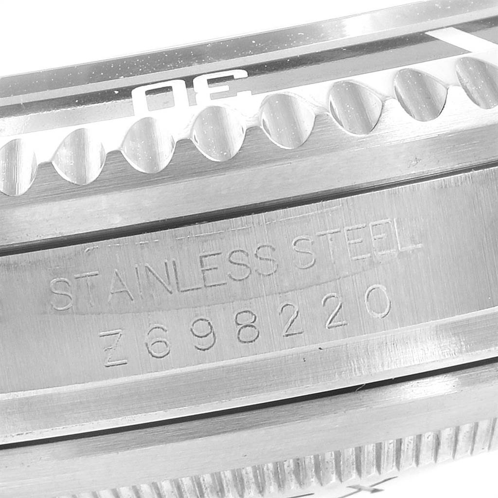 This image shows a close-up of the bezel and serial number engraving on a Rolex Sea-Dweller 16600 Men
s Stainless Steel Black Dial 16600 Men
s Stainless Steel Black Dial watch.