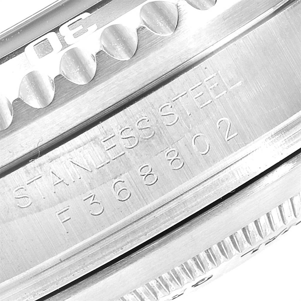 The image shows a close-up of the side view of the bezel and stainless steel case of the Rolex Sea-Dweller 16600 Men
s Stainless Steel Black Dial 16600 Men
s Stainless Steel Black Dial watch.