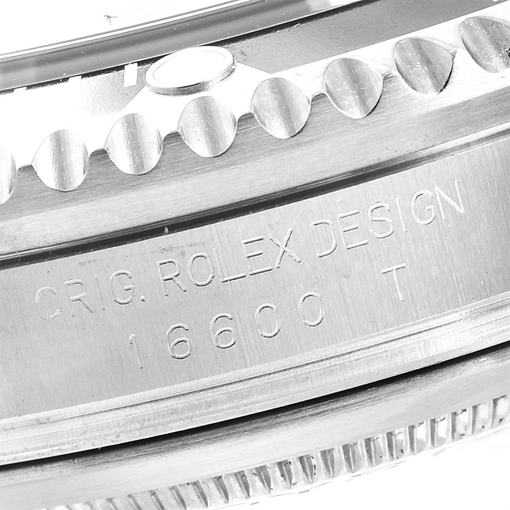 This image shows a close-up of the engraved watch case side and bezel of the Rolex Sea-Dweller 16600 Men
s Stainless Steel Black Dial 16600 Men
s Stainless Steel Black Dial model, indicating the design and model number 16600.