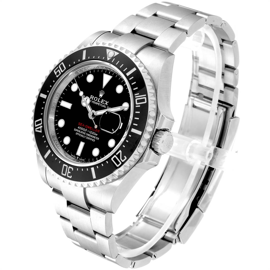 The image shows the Rolex Sea-Dweller 126600 Men
s Stainless Steel Black Dial 126600 Men
s Stainless Steel Black Dial watch at an angle displaying its face, bezel, crown, and metal bracelet.