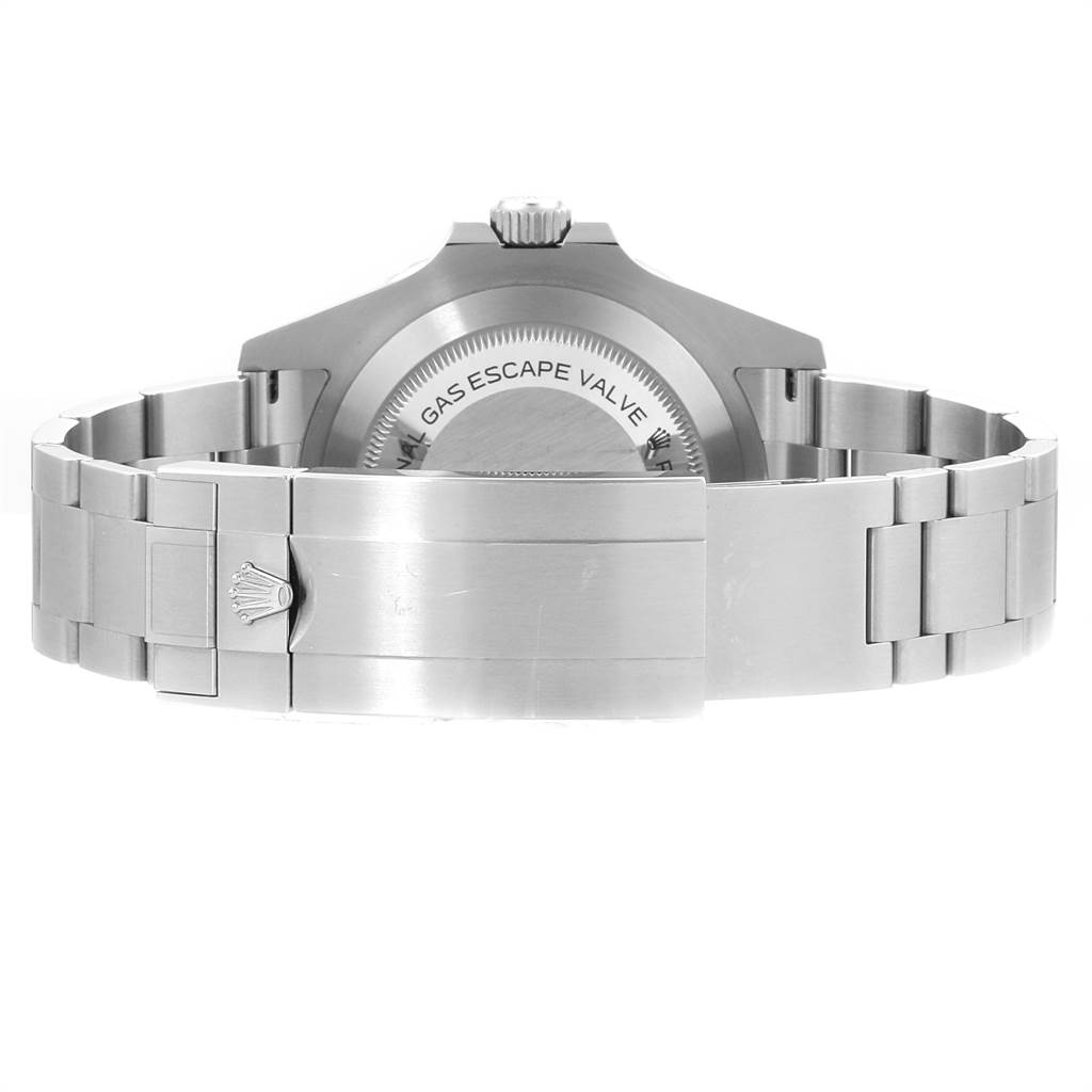 This image shows the backside and clasp of a Rolex Sea-Dweller 126600 Men
s Stainless Steel Black Dial 126600 Men
s Stainless Steel Black Dial watch, highlighting its gas escape valve and stainless steel bracelet.