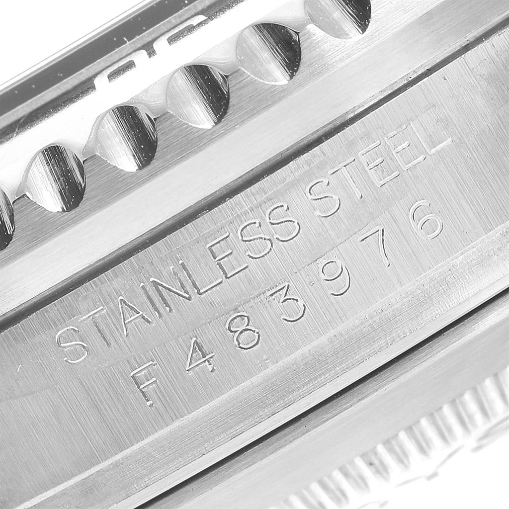 This image shows a close-up of the Rolex Sea-Dweller 16600 Men
s Stainless Steel Black Dial 16600 Men
s Stainless Steel Black Dial
s serial number and case material engraving.