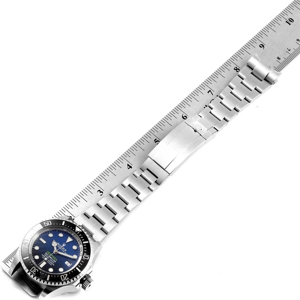 This image shows a Rolex Sea-Dweller 126660 Men
s Stainless Steel Blue Dial 126660 Men
s Stainless Steel Blue Dial watch from an overhead angle, displaying the full bracelet and part of the bezel.
