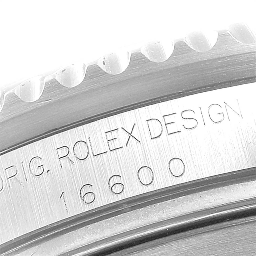 The image shows a close-up view of the case side engraving with model number on a Rolex Sea-Dweller 16600 Men
s Stainless Steel Black Dial 16600 Men
s Stainless Steel Black Dial watch.