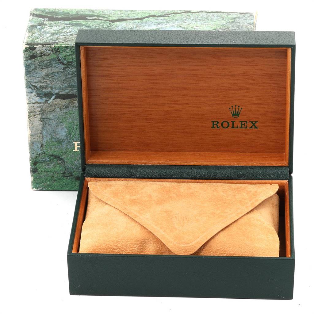 The image shows an open wooden Rolex box with a closed suede pouch inside, designed for the Sea-Dweller model.