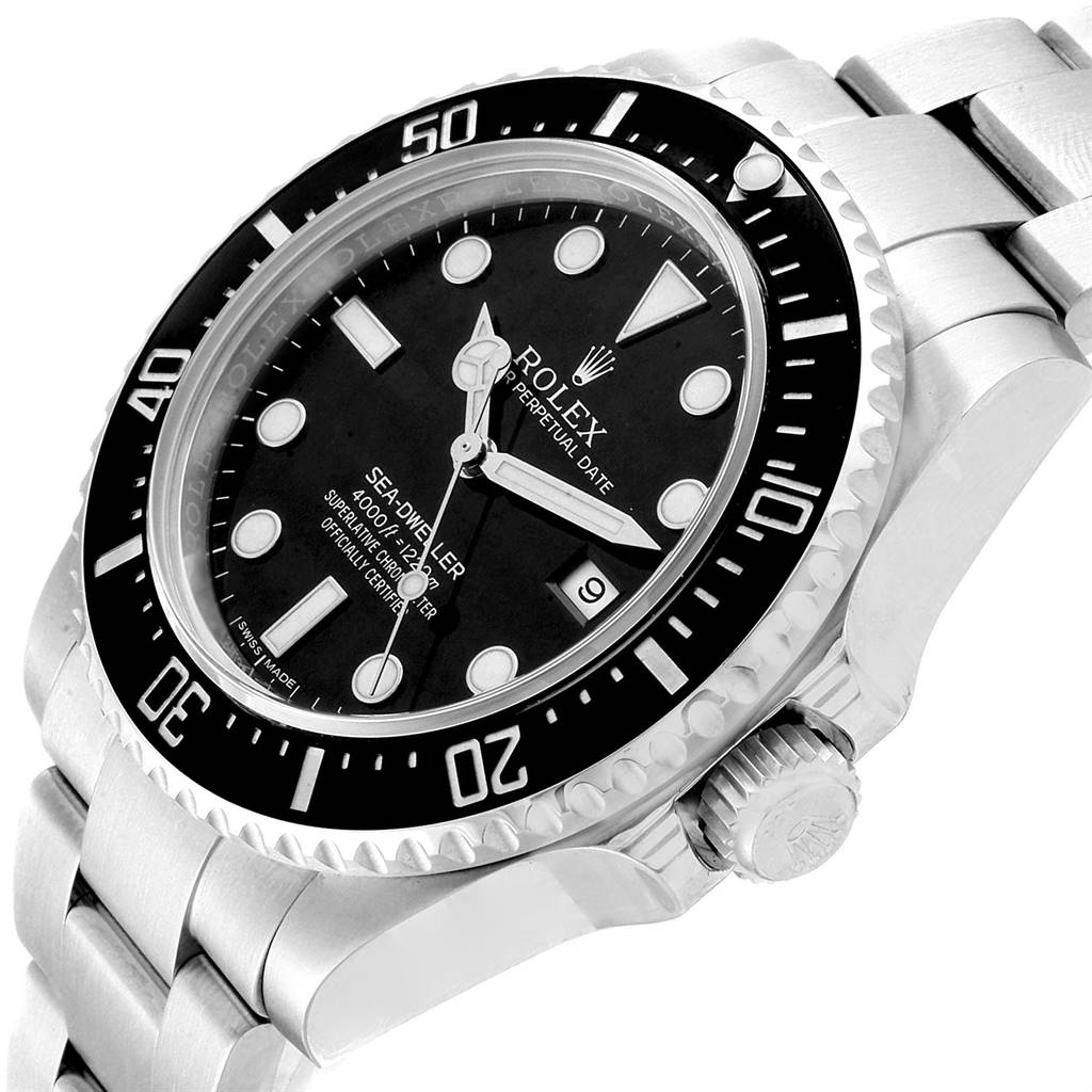 The image shows a side-angle view of the face and bezel of the Rolex Sea-Dweller 116600 Men
s Stainless Steel Black Dial 116600 Men
s Stainless Steel Black Dial watch, including part of the bracelet and crown.