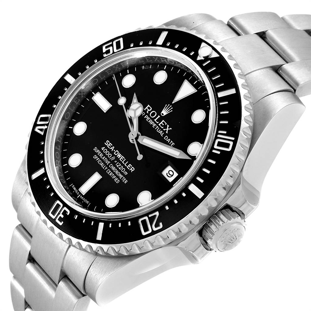 The image showcases a close-up, angled view of the Rolex Sea-Dweller 116600 Men
s Stainless Steel Black Dial 116600 Men
s Stainless Steel Black Dial watch, highlighting its black dial, bezel, crown, and part of the bracelet.