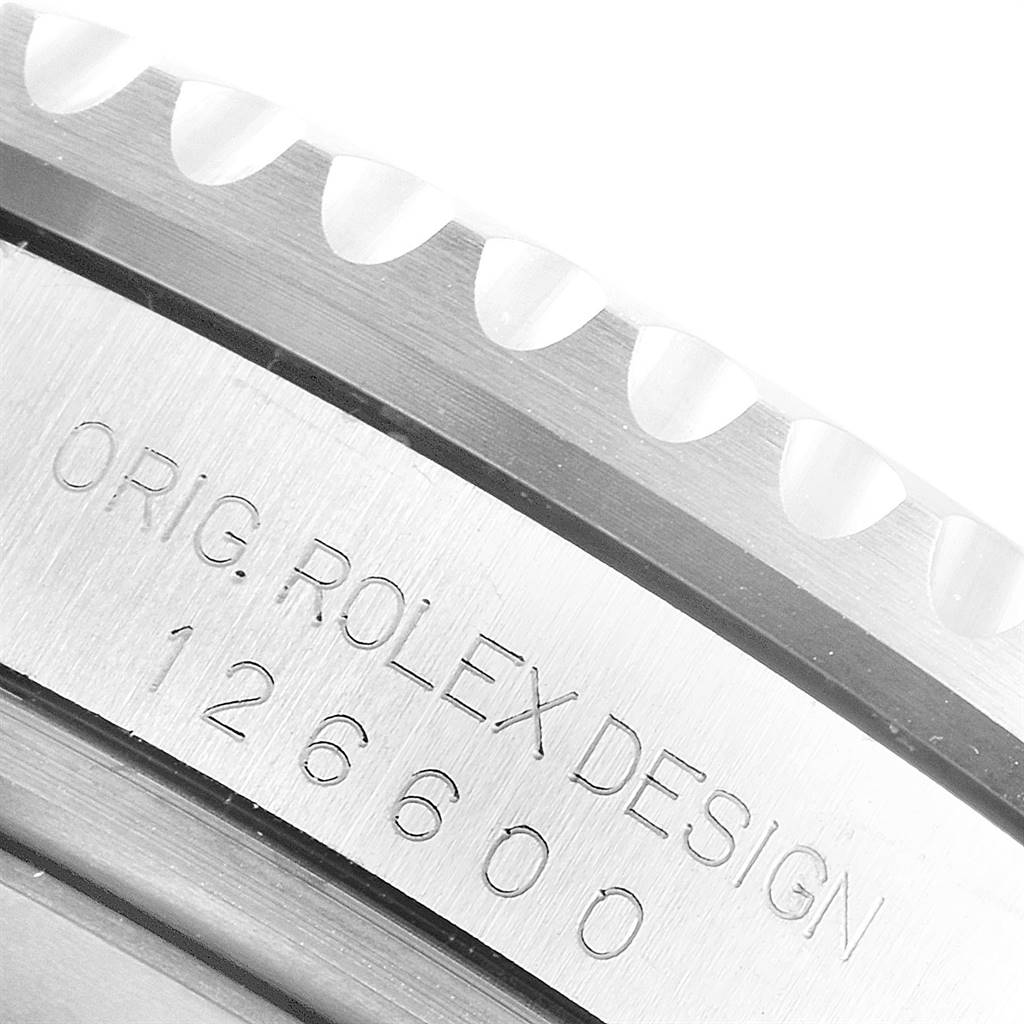 Close-up view of the bezel and case side of a Rolex Sea-Dweller 126600 Men's Stainless Steel Black Dial 126600 Men's Stainless Steel Black Dial, showing the engraved model number and "ORIG. ROLEX DESIGN."