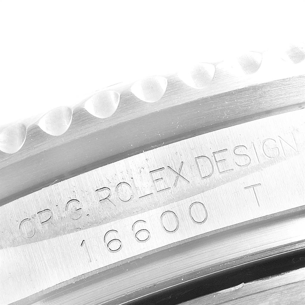 This close-up image shows the engraved bezel and case of the Rolex Sea-Dweller 16600 Men
s Stainless Steel Black Dial 16600 Men
s Stainless Steel Black Dial model 16600.