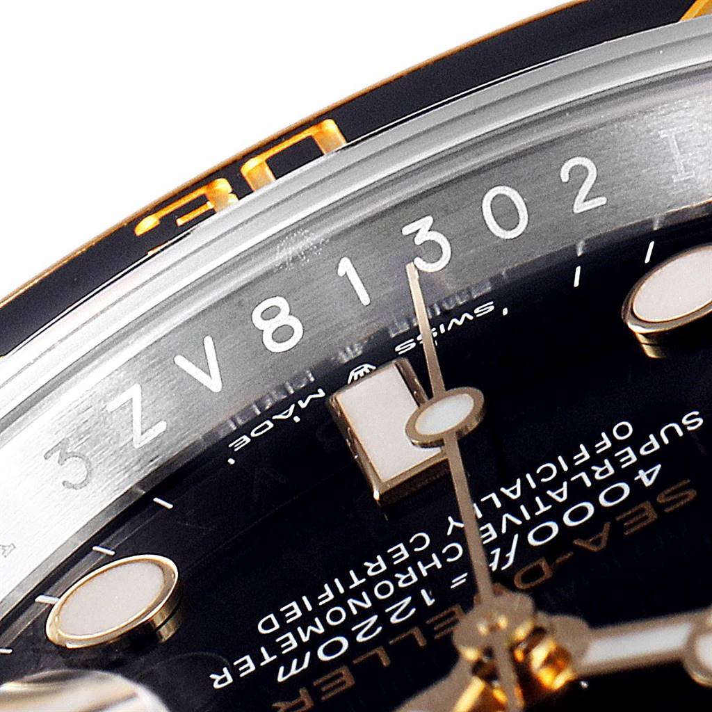 The image is a close-up view of the dial and bezel of a Rolex Sea-Dweller 126603 Men's Steel and Gold (two tone) Black Dial 126603 Men's Steel and Gold (two tone) Black Dial watch, focusing on the indices and serial number.
