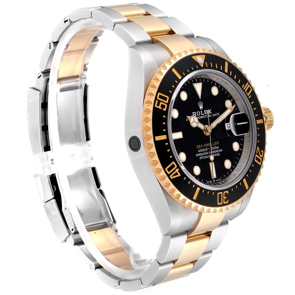 The Rolex Sea-Dweller 126603 Men's Steel and Gold (two tone) Black Dial 126603 Men's Steel and Gold (two tone) Black Dial watch is shown at an angled side view, displaying its bezel, dial, and two-tone bracelet.