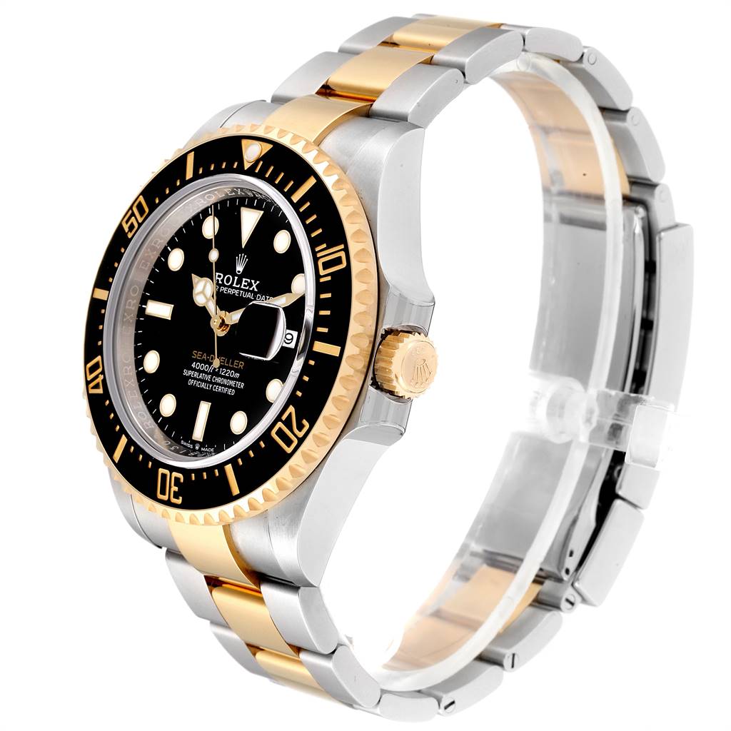 The Rolex Sea-Dweller 126603 Men's Steel and Gold (two tone) Black Dial 126603 Men's Steel and Gold (two tone) Black Dial watch is shown from a side angle, displaying its dial, bezel, crown, and two-toned bracelet.