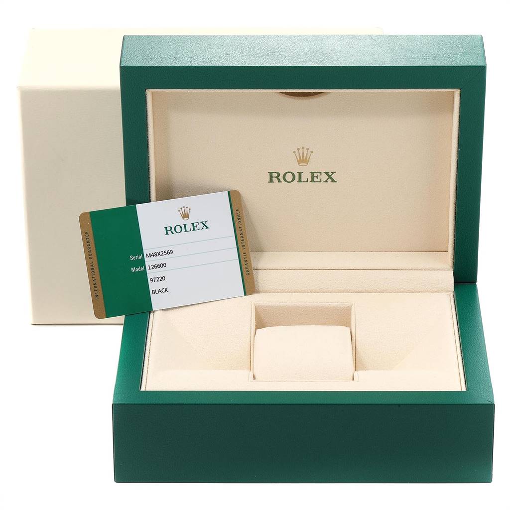 The image shows the case and Best Quality
ity card for a Rolex Sea-Dweller 126600 Men
s Stainless Steel Black Dial 126600 Men
s Stainless Steel Black Dial watch, viewed from the front.