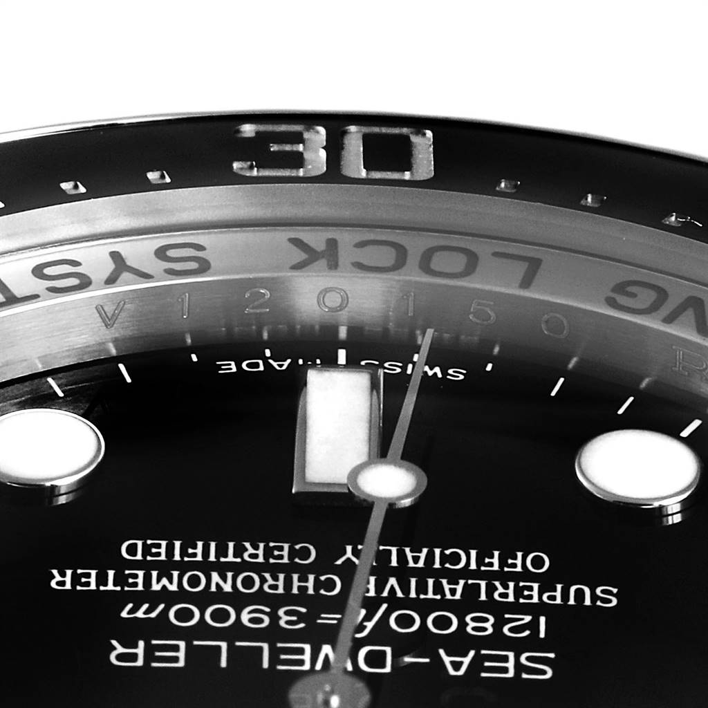 This close-up image of a Rolex Sea-Dweller 116660 Men
s Stainless Steel Black Dial 116660 Men
s Stainless Steel Black Dial watch shows the dial, hands, and part of the rotating bezel with the "0" mark.