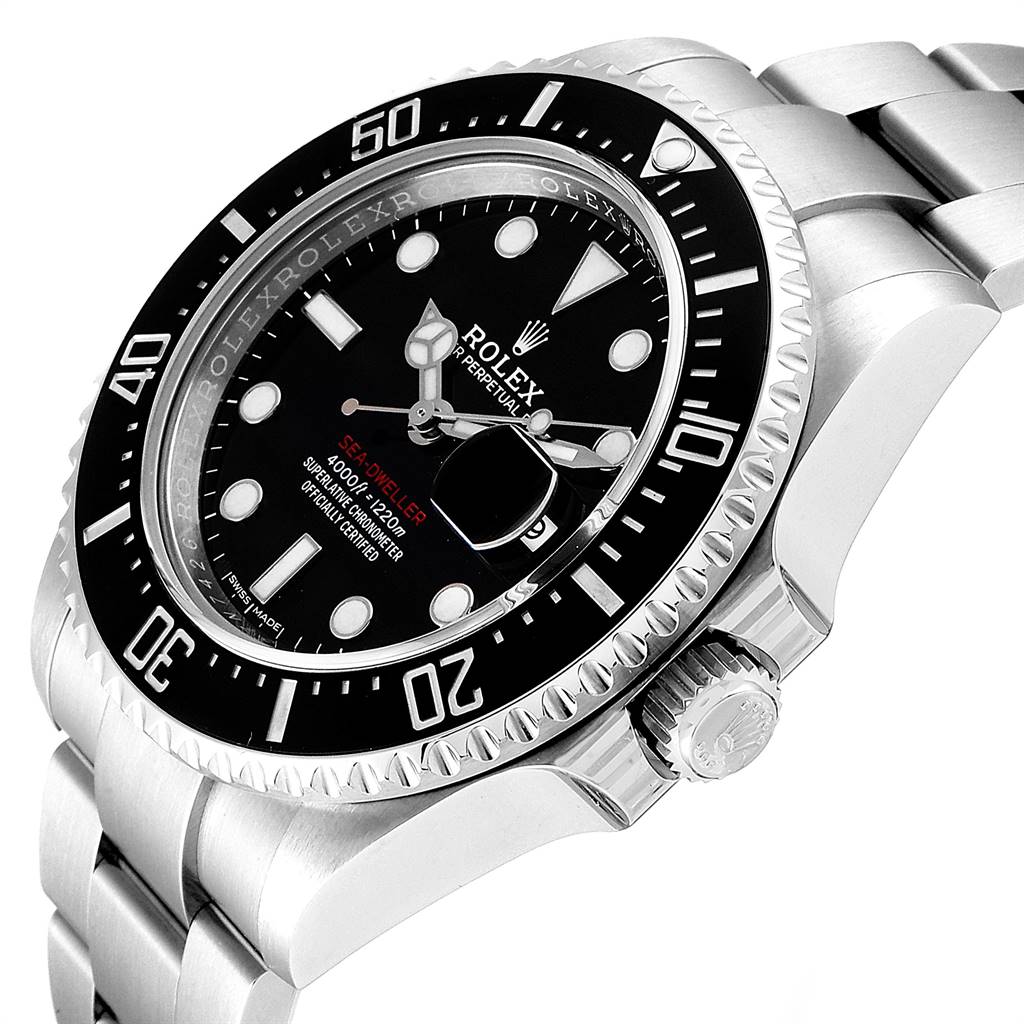 The image shows a Rolex Sea-Dweller 126600 Men
s Stainless Steel Black Dial 126600 Men
s Stainless Steel Black Dial watch from a side angle, highlighting its bezel, dial, and part of the bracelet.