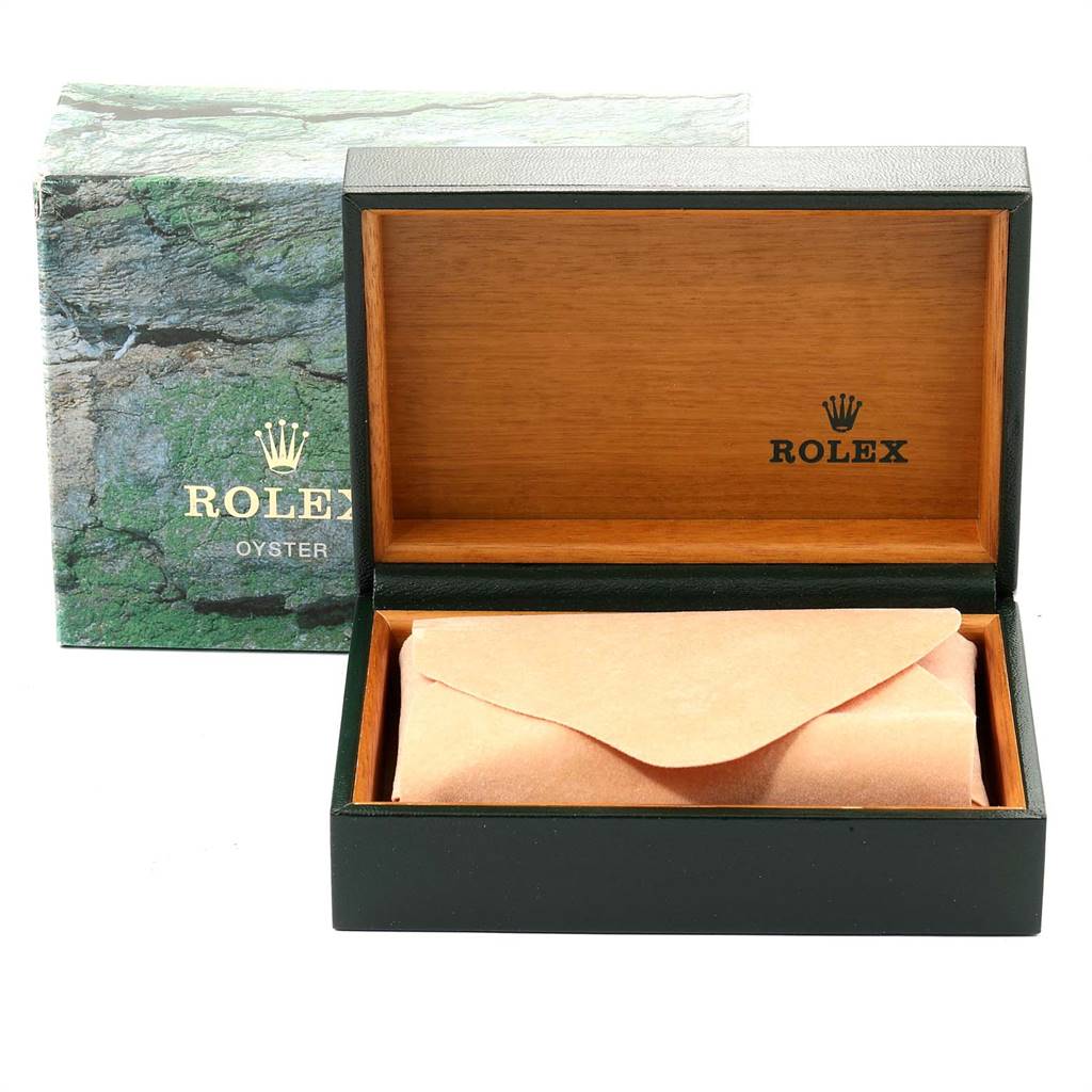 The image shows an open Rolex Sea-Dweller 16600 Men
s Stainless Steel Black Dial 16600 Men
s Stainless Steel Black Dial watch box with its interior, packaging, and outer box visible.