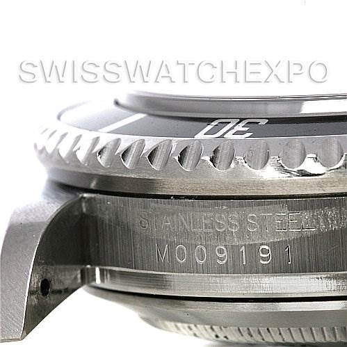 The image shows a close-up side view of the bezel, case, and serial number engraving on a Rolex Sea-Dweller 16600 Men's Stainless Steel Black Dial 16600 Men's Stainless Steel Black Dial watch.