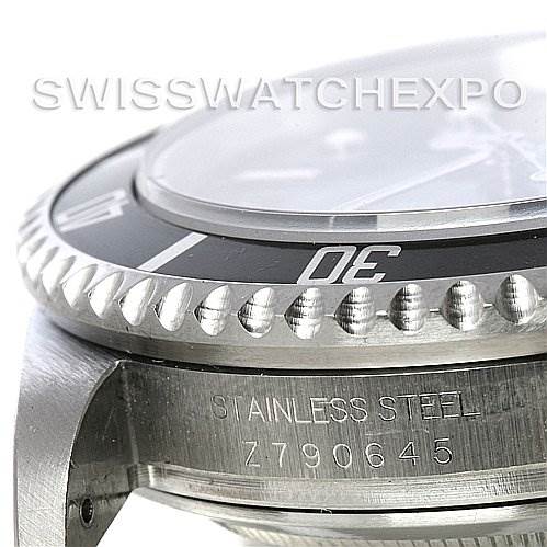 Close-up angle showing the bezel, crystal, and part of the case with the serial number of the Rolex Sea-Dweller 16600 Men's Stainless Steel Black Dial 16600 Men's Stainless Steel Black Dial watch.