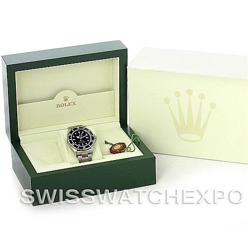 This image shows a Rolex Sea-Dweller 16600 Men's Stainless Steel Black Dial 16600 Men's Stainless Steel Black Dial watch in its green and cream presentation box, with a logo-tag and the outer box partially visible.