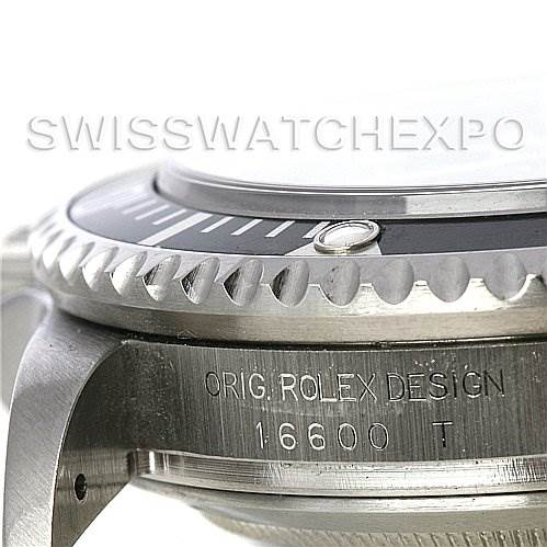 This close-up image of the Rolex Sea-Dweller 16600 Men's Stainless Steel Black Dial 16600 Men's Stainless Steel Black Dial shows the bezel, part of the case, and the engraved model number 16600.