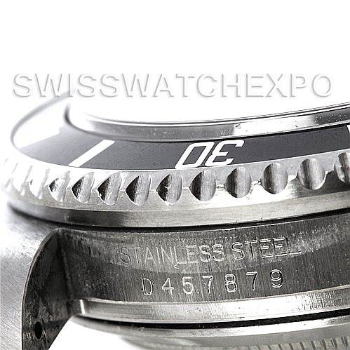 The image shows a close-up of the side of the Rolex Sea-Dweller 16600 Men's Stainless Steel Black Dial 16600 Men's Stainless Steel Black Dial watch, highlighting the bezel and the engraved serial number.
