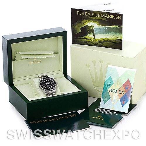 This image shows a Rolex Sea-Dweller 16600 Men's Stainless Steel Black Dial 16600 Men's Stainless Steel Black Dial watch in its original box, accompanied by the outer box, manuals, and warranty card.