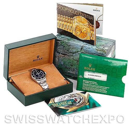 The image shows the Rolex Sea-Dweller 16600 Men's Stainless Steel Black Dial 16600 Men's Stainless Steel Black Dial watch in its box with accompanying booklets and authenticity card.