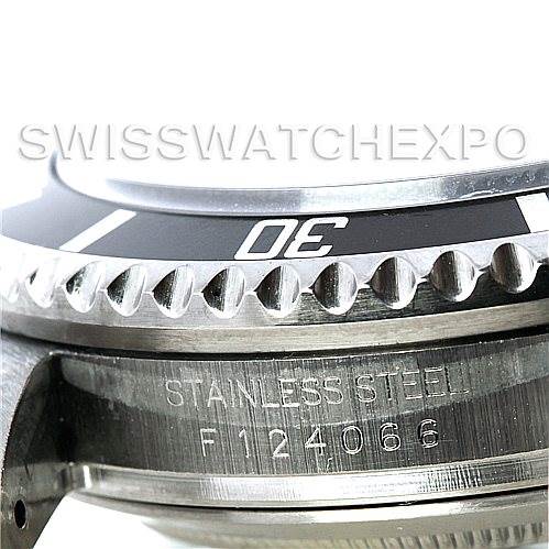 The image shows a close-up of the Rolex Sea-Dweller 16600 Men's Stainless Steel Black Dial 16600 Men's Stainless Steel Black Dial's bezel and case, highlighting the "30" mark and part of the serial number.