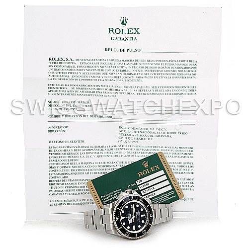 This Rolex Sea-Dweller 116660 Men
s Stainless Steel Black Dial 116660 Men
s Stainless Steel Black Dial watch is pictured at a front angle, accompanied by its warranty card and documentation.